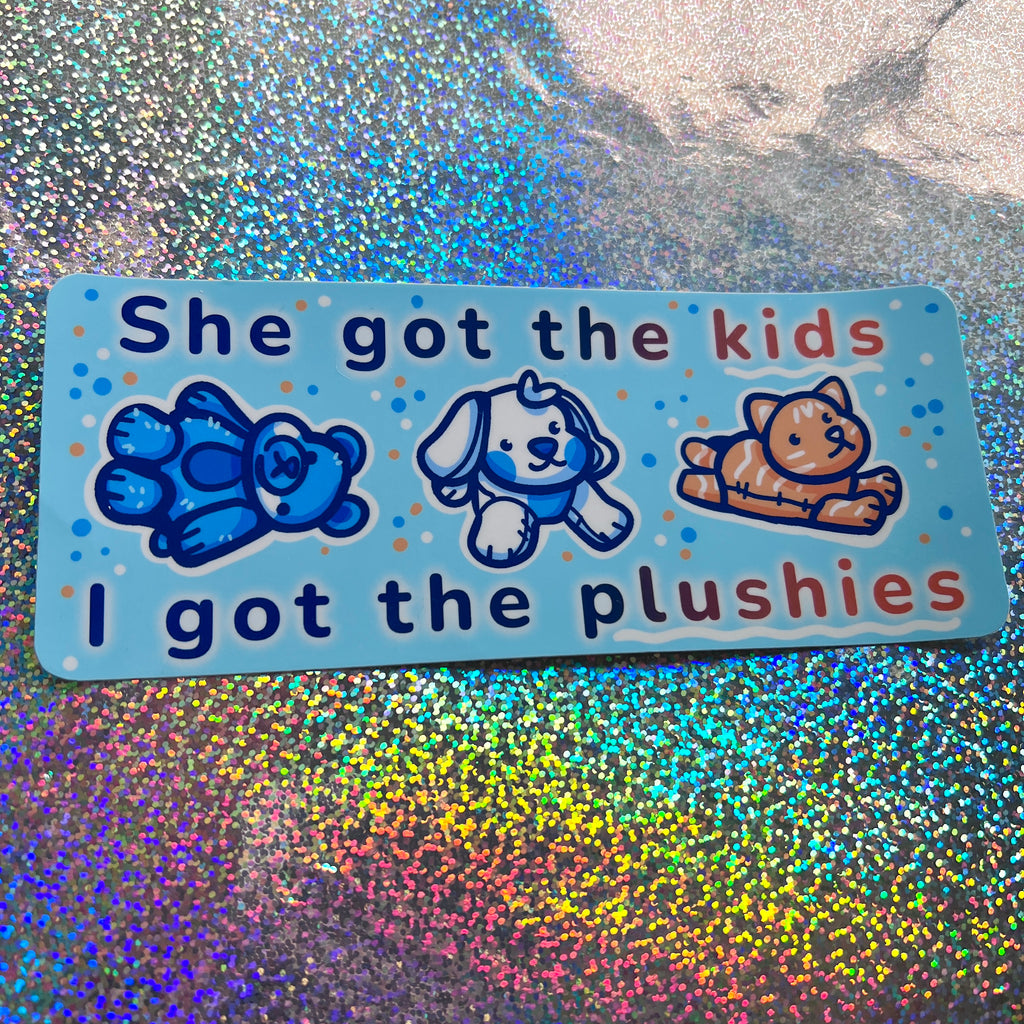A sticker that has three stuffed animals and text that says "She Got the Kids.. I Got the Plushies"