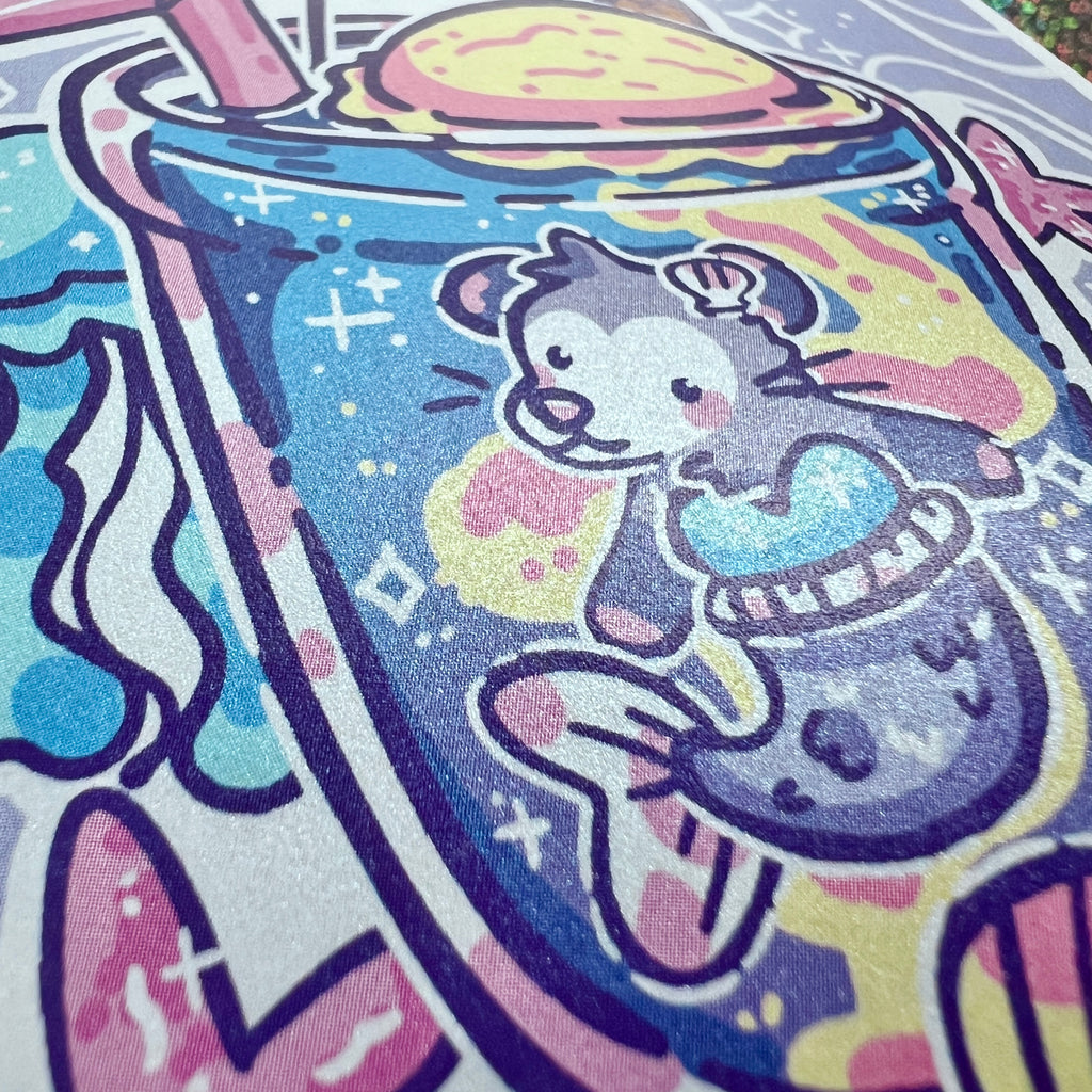 a print of a a mermaid opossum enjoying a swim in her favorite summer themed drink