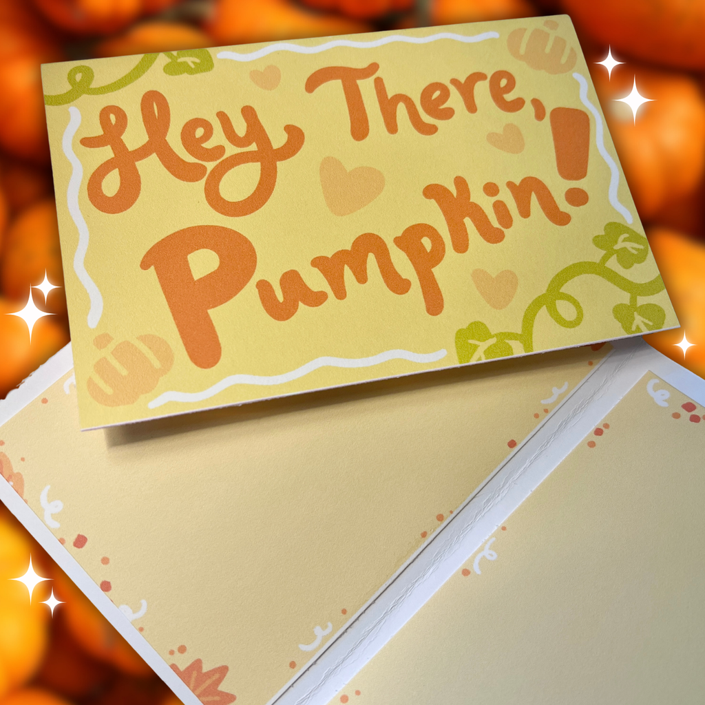 Greeting card with 'Hey There, Pumpkin!' text on a pumpkin-themed background