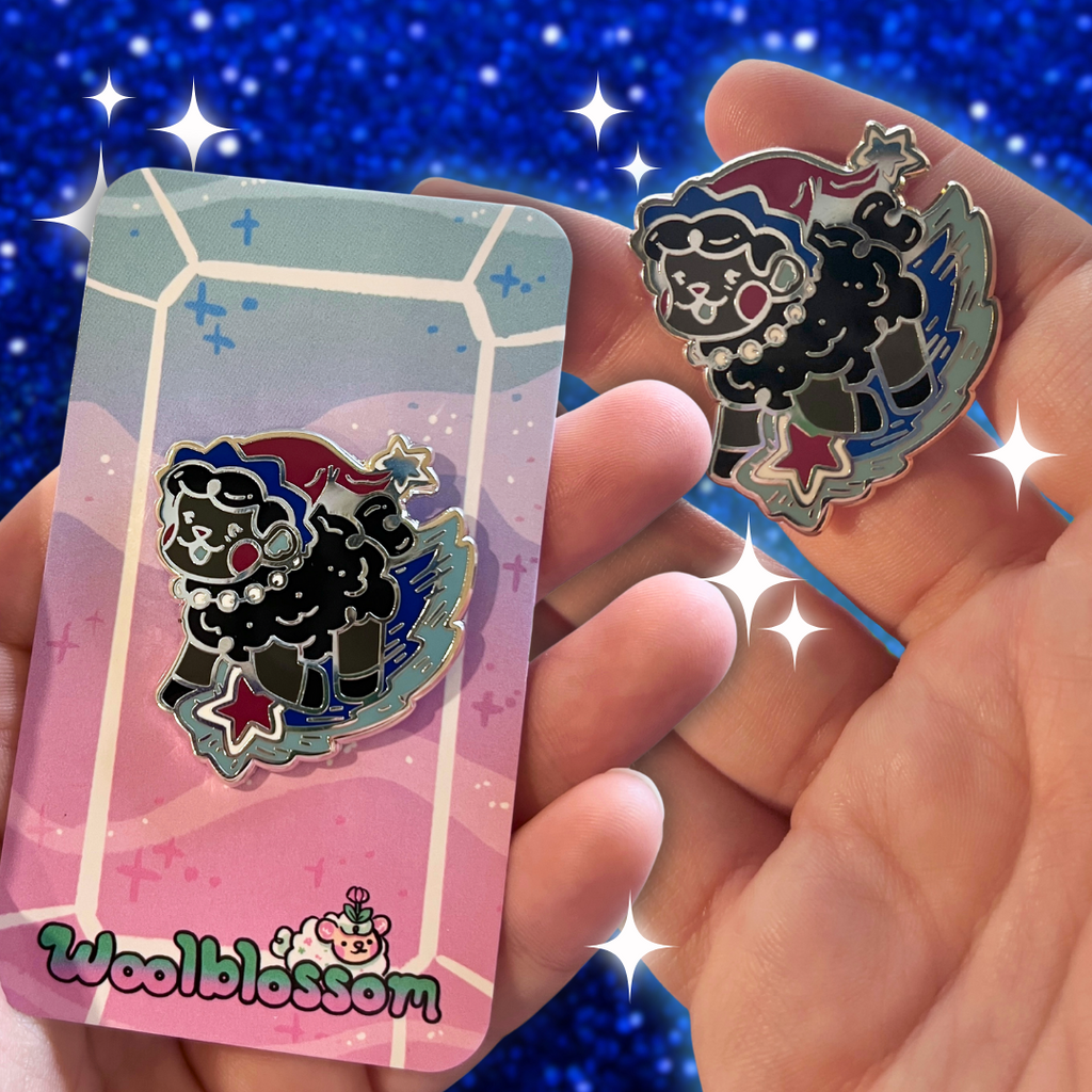 Space witch sheep themed pin with a card featuring the brand 'Wool Blossom' against a blue glittery background.