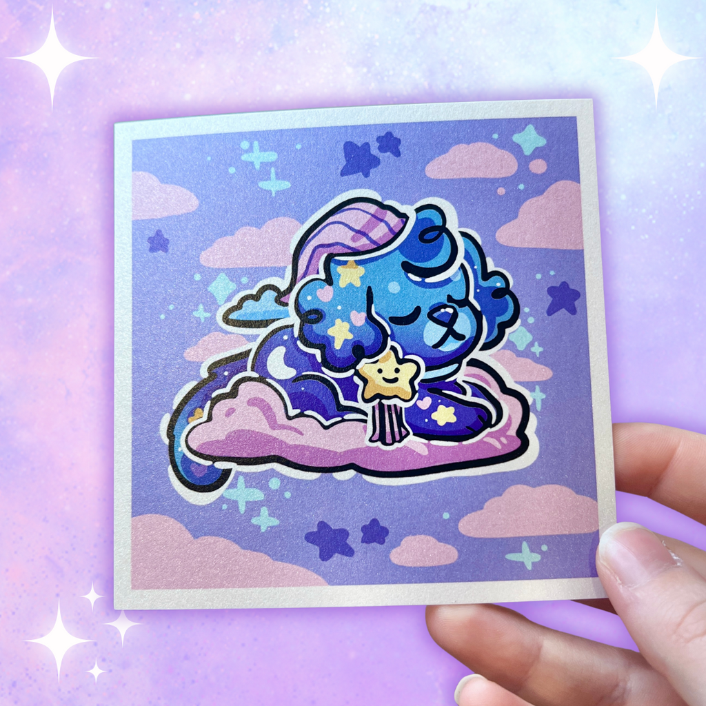 A print of a puppy with a bedtime cap, blue skin, and star bow on a pink cloud in a blue sky