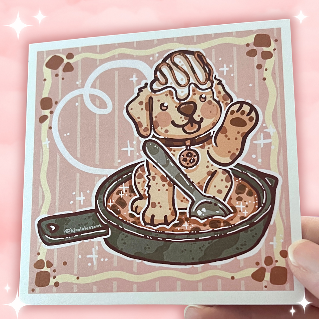 print of a puppy in a cookie skillet on a pink background