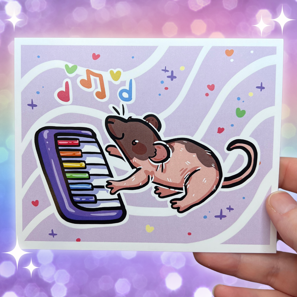 A print of a brown/pink mostly hairless rat playing a rainbow piano