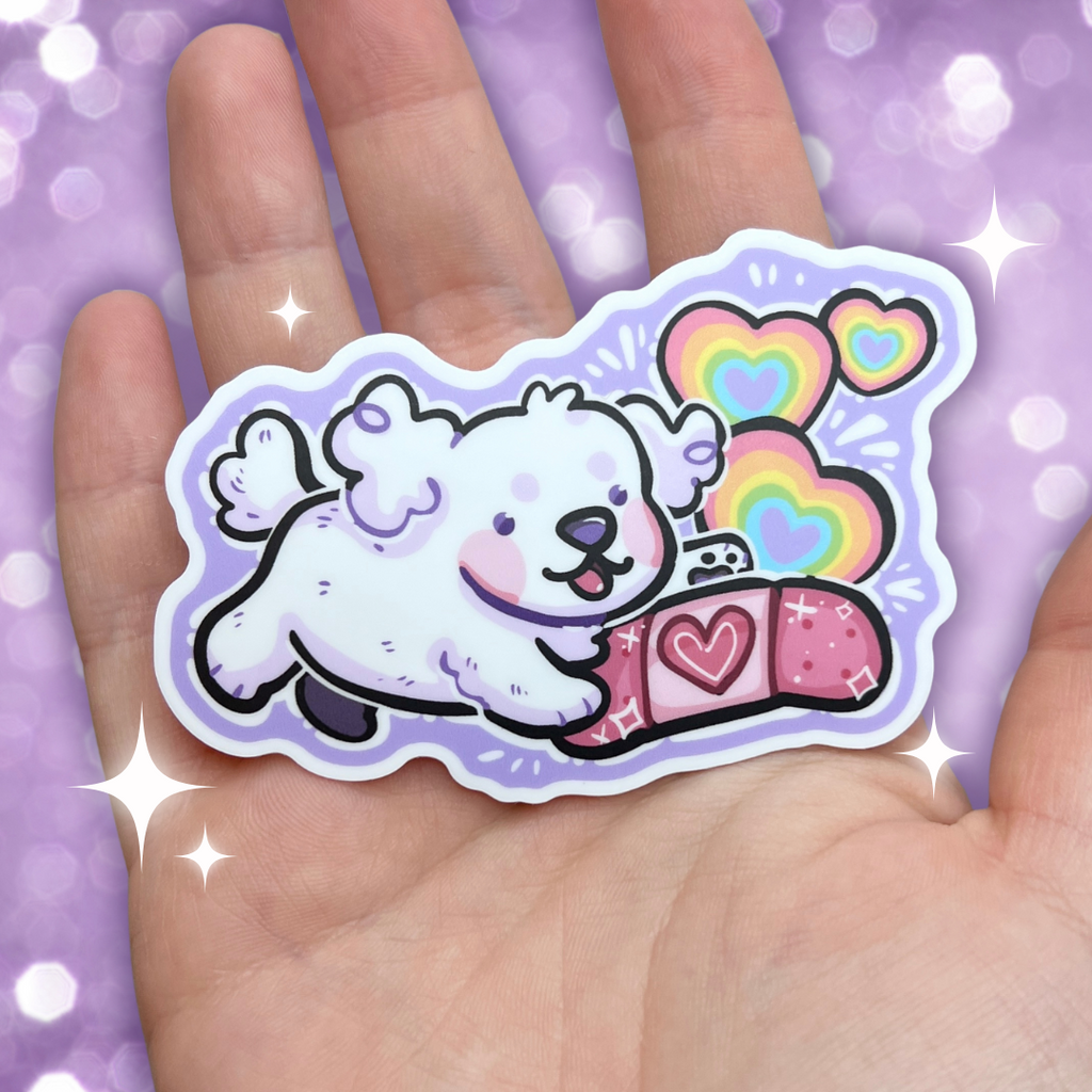 A sticker of a white puppy happily holding a pink bandage with rainbow hearts popping up